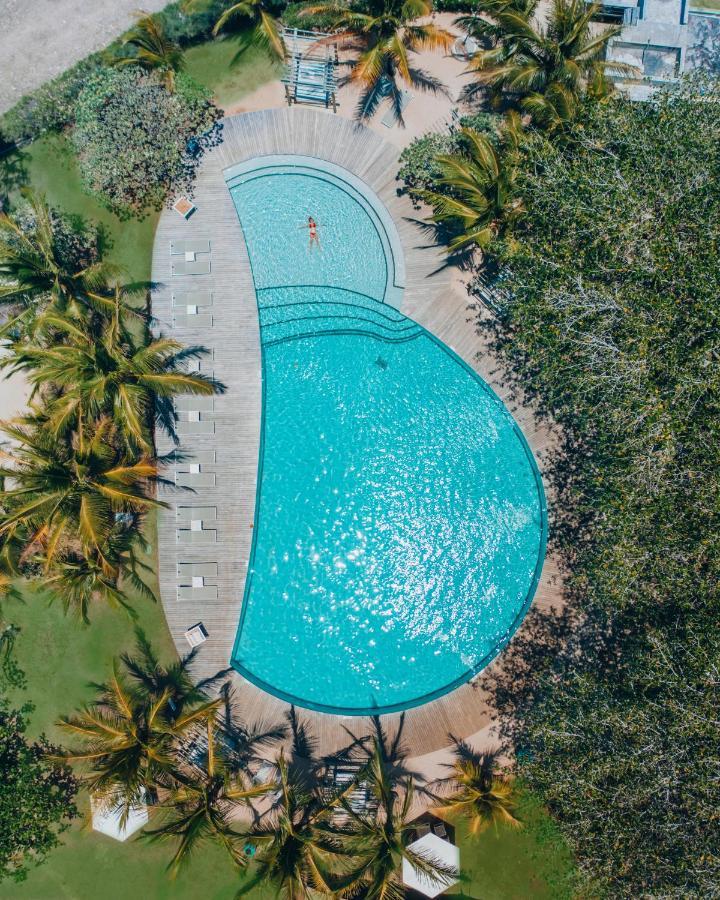 Lux* Grand Gaube Resort & Villas Εξωτερικό φωτογραφία Aerial view of the pool at the 2019 World Championships
